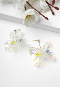 Boucles d'oreilles florales blanches