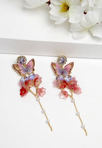 Boucles d'oreilles longues suspendues en cristal papillon